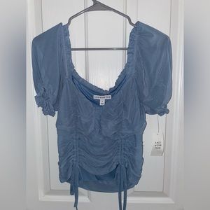 Blue top with cinched sides